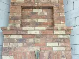 Угловой камин уникальной конструкции из кирпича Terca