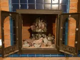 Чугунная печь Везувий в&nbsp;декоративной кирпичной облицовке с&nbsp;изразцами