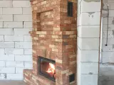 Угловой камин уникальной конструкции из кирпича Terca