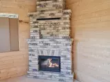 Угловой теплонакопительный камин из немецкого кирпича Kratki Wiktor