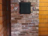 Традиционная банная печь-​каменка из старинного кирпича со Schiedel